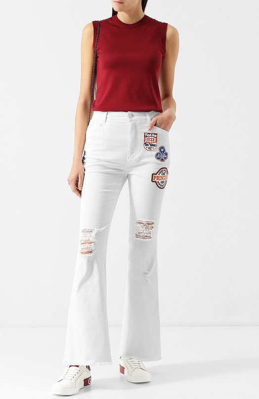 Расклешенные джинсы с потертостями и декоративной отделкой Dolce&Gabbana 